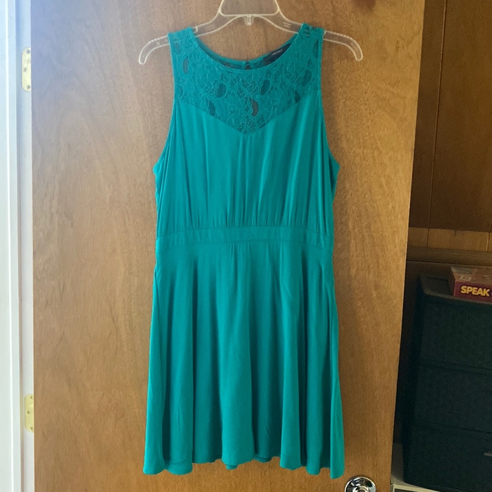 High neck, key hole back dress.